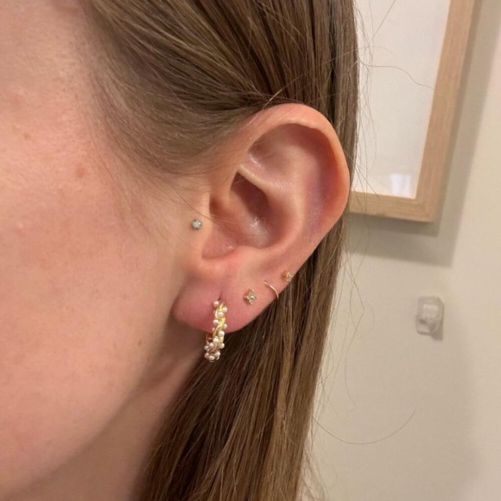 The Caterina huggie gold hoop Pearl earrings twist braided